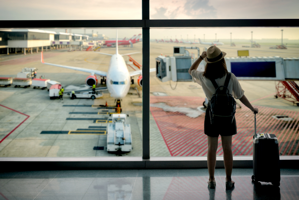 Woman standing in an airport